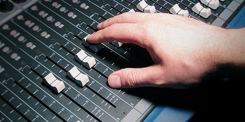 hand-on-faders-500×250